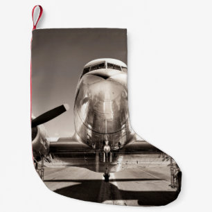 vintage flygplan på bana liten julstrumpa
