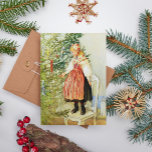 Vintage jul Carl Larsson Svenskt Julkort<br><div class="desc">Svenska konstnären Carl Larsson (1853-1919). Illustration av en flicka som är klädd i en traditionell folkdräkt,  som dekorerar en julgran.</div>