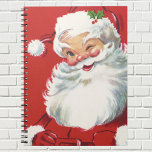 Vintage jul, Jolly Winking Jultomten Anteckningsbok<br><div class="desc">Vintage illustrerar julens helgdag med lycklig,  jolly Jultomten som bär hatt och vinkling som om han hade en hemlighet. Ho,  ho,  ho,  God jul!</div>