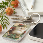 Vintage jul, Victorian Jultomten med Gräs<br><div class="desc">Vintage illustrerar julens helgdag med en viktoriansk Jultomten som håller gräs boughs och en säck fullt av julklapp leksaker.</div>