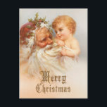 Vintage Jultomten med leende barn Helg Vykort<br><div class="desc">Snygg illustration från den gamla världen som visar att Saint Nicholas håller ett leende barn med gyllene garderoller som på ett lekande sätt drar på sig sina flytande vita whiskers. Guld Gammal engelska stil God jul (frivillig uppgift).</div>
