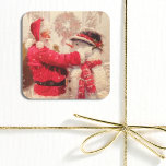 Vintage Jultomten Snögubbe jul Fyrkantigt Klistermärke<br><div class="desc">Vintage Jultomten Snögubbe: Julfärer och etiketter har ett joviskt Jultomten och snögubbe i snö. Perfekt för omslagning av julklappar,  favoriter och gåvor. Skapat av Evco Helgdagars www.zazzle.com/store/evcosholidays</div>