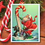 Vintage Jultomten som målar A Candy cane Helg Vykort<br><div class="desc">Vintage Santa målar ett candy cane-exempel.</div>