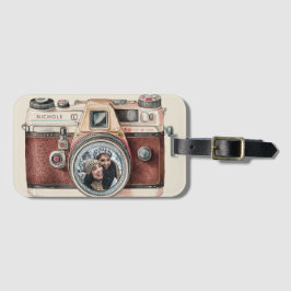 Vintage kamera med foto bagagebricka