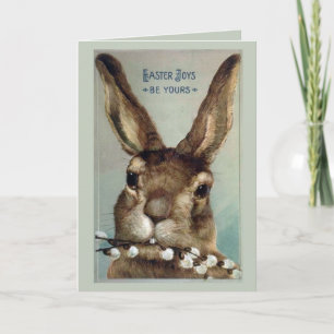 Vintage kaninbunny i Påsk med kåda i gren Helgkort