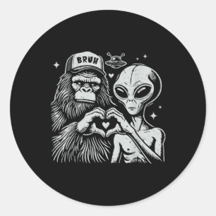 Vintage - lätt Bigfoot och främmande hjärthandsign Runt Klistermärke