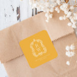 Vintage Monogram Crest Marigold Yellow Wedding Fyrkantigt Klistermärke<br><div class="desc">This elegant design features an ornate,  regency vintage-inspired crest of acanthus leaves framing two monogram initials in open serif font,  stacked vertically and separated by a thin horizontal line. Add the couple's names and wedding date below. The design and text are in white on a marigold yellow background.</div>