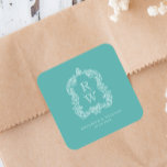 Vintage Monogram Crest Names Turquoise Wedding Fyrkantigt Klistermärke<br><div class="desc">This elegant design features an ornate,  regency vintage-inspired crest of acanthus leaves framing two monogram initials in open serif font,  stacked vertically and separated by a thin horizontal line. Add the couple's names and wedding date below. The design and text are in white on a turquoise background.</div>
