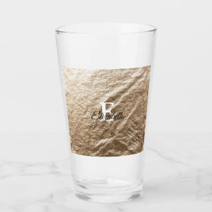 Vintage Monogramtypografi guld har fallit samman p Glaskopp
