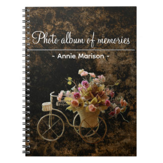 Vintage mönsterbok med bild på cykel med blommor anteckningsbok