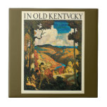 Vintage NC Wyeth Travel Poster, i gamla Kentucky Kakelplatta<br><div class="desc">Vintage illustration USA:s reseaffisch eller bagageetikett för Kentucky av N. C. Wyeth med två pionjärer eller frontiersmän i bergen på land med traditionella läderkläder,  konfektionshattar och jakt på hjort i skogen. En dal med en flod är i avstånd. Texten står: på Gamla Kentucky.</div>