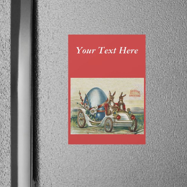 Vintage påskkaniner blommor bil ägg (Two Easter rabbits big blue egg driving vintage car on red Happy Easter fridge magnet.)
