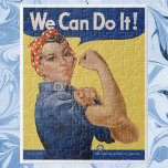 Vintage Patriotic Rosie Riveter, vi kan göra det! Pussel<br><div class="desc">Vintagen illustrerar patriotismens utformning med ett dam som sedan dess har blivit känt som Rosie the Riveter. "Vi kan göra det!" är ett amerikanskt Världskrig II-poster som  en inspirerande bild för att öka den kvinnliga arbetarmoralen.</div>