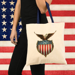 Vintage patriotism, stolt örn över amerikanska fla tygkasse