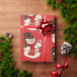 Vintage Retro Jolly Snögubbe under jul i Top hat Presentpapper<br><div class="desc">Denna roligt och pappra inslagning av jultomten är en tillbakagång till den klassiska julhelgen. En mönstrad design med en glad snögubbe med top hat,  halsduk och candy cane mot en traditionell julröd bakgrund som säkert ger dina gåvor en vintage klassisk beröring.</div>