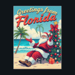 Vintage Retro Jultomten vid Beach-Florida Vykort<br><div class="desc">Fira en tropisk jul med det här roligt vintagen-vykortet med Jultomten-avslappning på en Florida-strand. Perfekt för att sprida helgdag med en varm tvist visar vykortet en nostalgisk utformning med en levande strandbakgrund,  ett dekorerat Julgran och fet "Hälsning från Florida" text. Idealisk för dem som kärlek unika helgdag vibes.</div>
