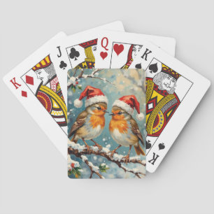 Vintage rödhakor med jultomtehattar på snötäckt gr casinokort