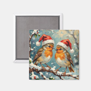 Vintage rödhakor med tomteluvor på snötäckt gren magnet