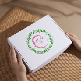 Vintage rosa jultomte, inramad av en grön krans klistermärken