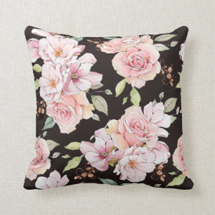 Vintage rosa ros på mörk-brunt kudde