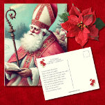 Vintage Sankt Nicholas Prayer för festdagen Vykort<br><div class="desc">Märk julstämningen med det här charmerande postkortet med en vintage illustration av St. Nicholas. St Nicholas är en gammal biskop som vänder sig mot ett snöslandskap och ger gåvor till lyckliga barn, och fångar det centrala i generositet och välvilja. Perfekt för din helgdag, det här postkortet ger dig en gnutta...</div>
