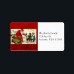 Vintage Santa Adressetiketters Adressetikett<br><div class="desc">Vinterscenen i vintage som skildrar Santa ge leksaker till att vänta på barn medan deras valp ger uppmärksamhet. Bilden har blivit lovande återställd.</div>