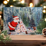 Vintage Santa and Woodland Animals Cute Retro Helg Vykort<br><div class="desc">Vintage Santa and Woodland Animals Cute Retro Helgdag Postcard. Denna utformning har en vintage med Jultomten och skogsdjur i den skog som dekorerar Julgran. Vilken vacker helgdag.</div>