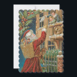 Vintage Santa Bringing Presenter Julkort<br><div class="desc">Den vackra julillustrationen i guld är rik och har färgad och utsmyckad med högdagrar. Den har en röd-robed Jultomten med presenter och viftar med ett mor och ett barn som hälsar honom från sin balkong.</div>