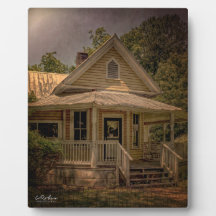 Vintage Wooden House with Porch on a Sunny Day