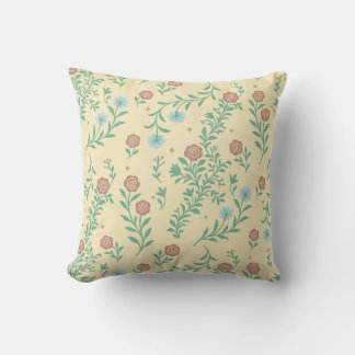 Vintageblommig kudde med blå blommor och rosor
