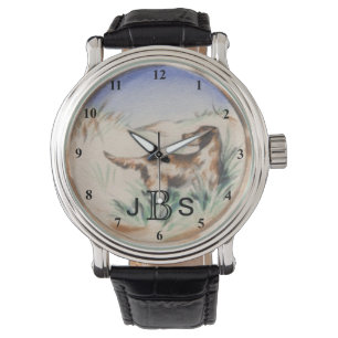 Vintagefågelhund som jagar den manliga armbandsur