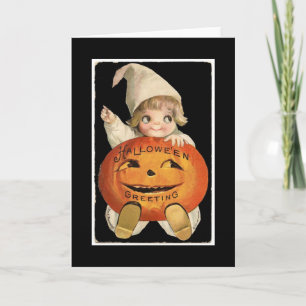 Vintageliten flicka med stor Halloween pumpa Kort