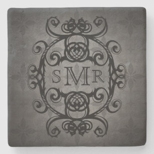 Vintagemonogramsvart och grått stenunderlägg
