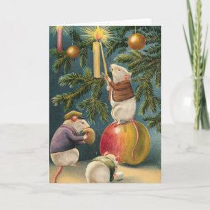Vintagemöss som tänder julgranen helgkort