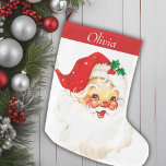 Vintagen Santa Personlig i Cute Mid Century Stor Julstrumpa<br><div class="desc">Denna fantastiska julklapp är en nostalgisk nod till 2000-talets helgdag, med en underbar vintage jultomtebild som utstrålar värme och glädje. Framkanten visar tomten i hans klassiska röda kostym med rosyska kinder och en vink i öga, som fångar den tidlösa andan från förra julen. I toppen visas ditt namn och du...</div>