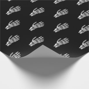 Vintageskelett räcker festligt presentpapper