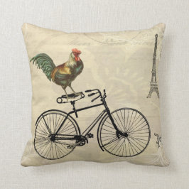 Vintagetupp som rider en cykel vid det Eiffel torn Kudde