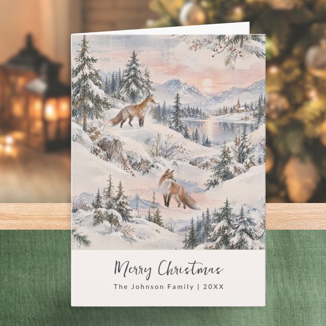 Vinter skog räv mysig akvarell snöig landskap kort (A Christmas card with winter foxes snow scene in a watercolor style, with personalized name and year)