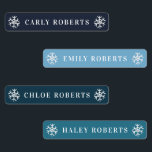 Vinterblå snöflingor Kids Namn vattentäta etikette Klistermärke<br><div class="desc">Winter Snöflingor Kids Watersecure Namn Labels med snöflingsilhuetter på vardera änden. Personlig Namn-etikettsmärken i blått och vitt.</div>