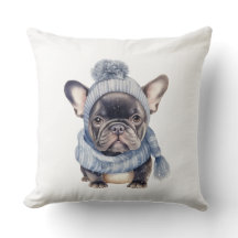 Vinterbulldoggbaby i blå mössa och halsduk