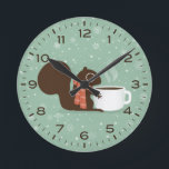 Vinterekorre med kaffektträdsdjur rund klocka<br><div class="desc">En roligt väggklocka för hemmet eller kontoret. En ekorre som bär en varm vinterscarf har en hett kopp av kaffe. Gör en helgdag till perfekten. Kolla in Jenns Doodle World för ännu fler dekorativa klockor och djurmatade hemdekanter.</div>