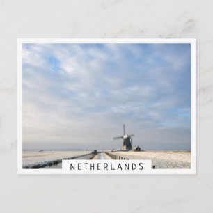 Vinterlandskap med snö och väderkvarn i Holland Vykort