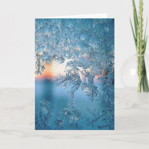 Vinterljus genom frostiga iskristaller glas helgkort