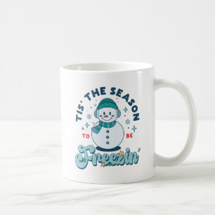Vintern detta år är frysen Teal Snögubbe Kaffemugg