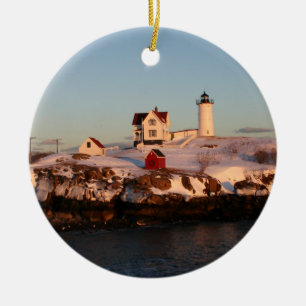 Vintersolnedgång vid nubbelljus julgransprydnad keramik