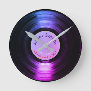 vinylrekordet, en purpurfärgad runda tar tid på rund klocka