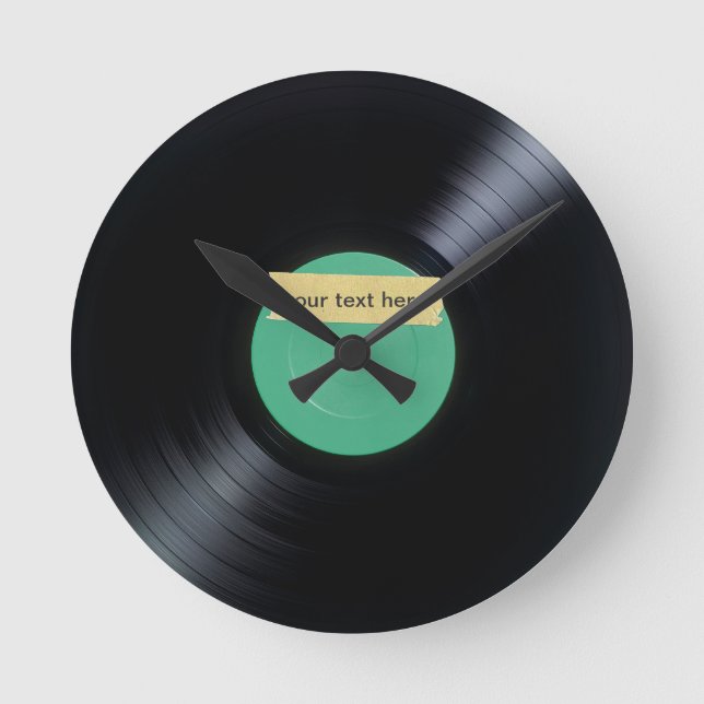 Vinylrekordet tar tid på rund klocka (Framsida)