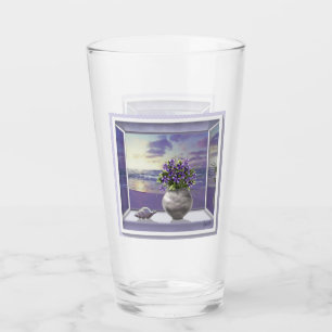 Violettes in a måne burk glaskopp