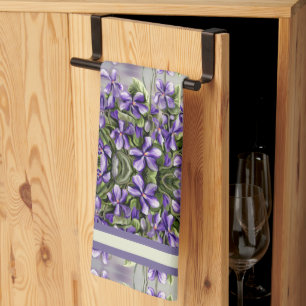 Violettes in a måne burk kökshandduk