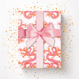 Virvlande drakar i rosa och orange presentpapper